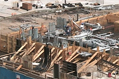 image of a residential tower with a concrete frame with lumber and steel abundant